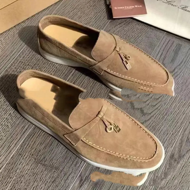 Gommino slip-on loafers with high-top design, round toe with steel head, and sewing line detail on artificial PU upper