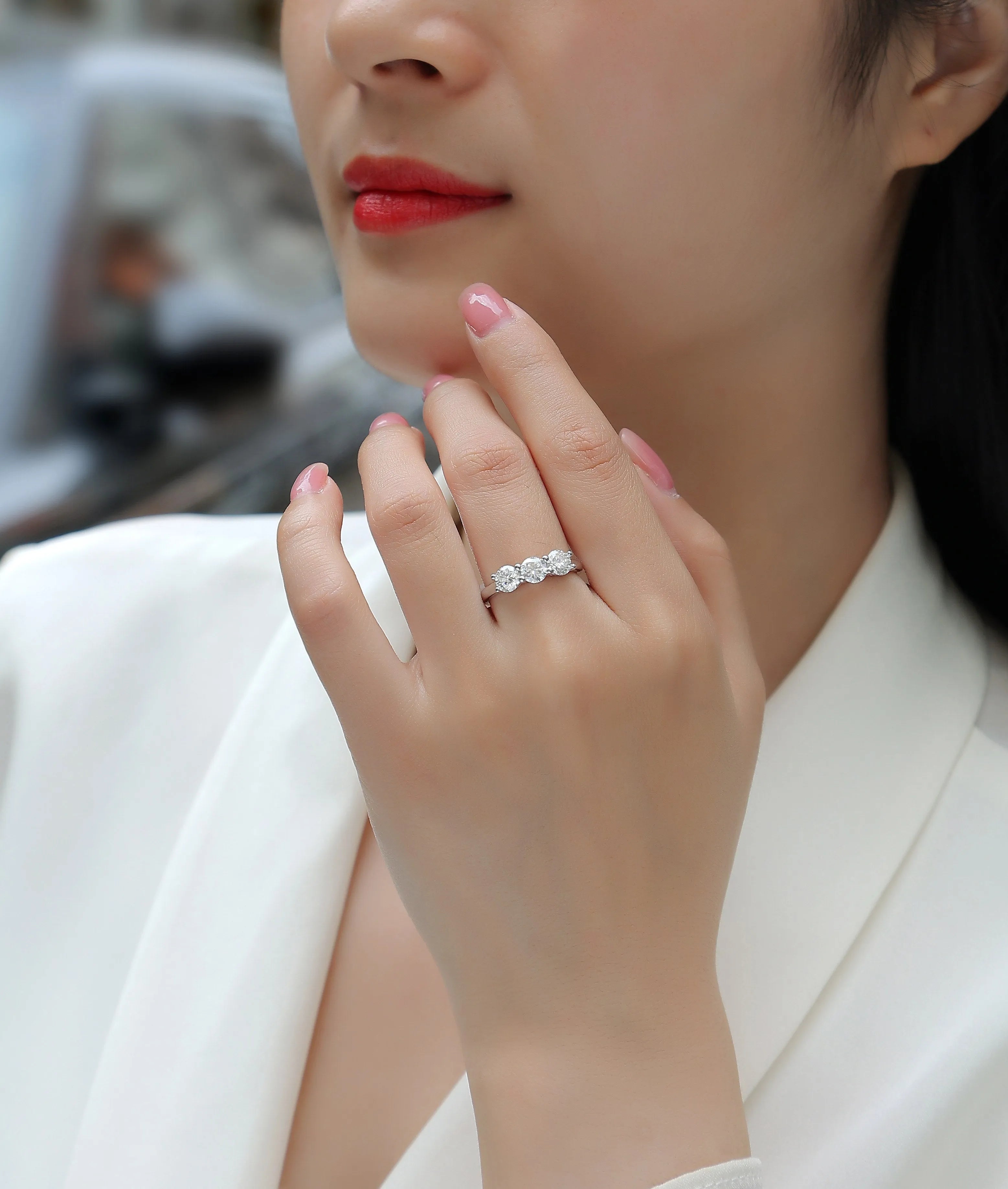 0.5 carat moissanite wedding ring set in S925 silver with platinum plating, gold colour, on white background