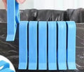 PP plastic non-slip clip for fixing garbage bags to the side of a bin.
