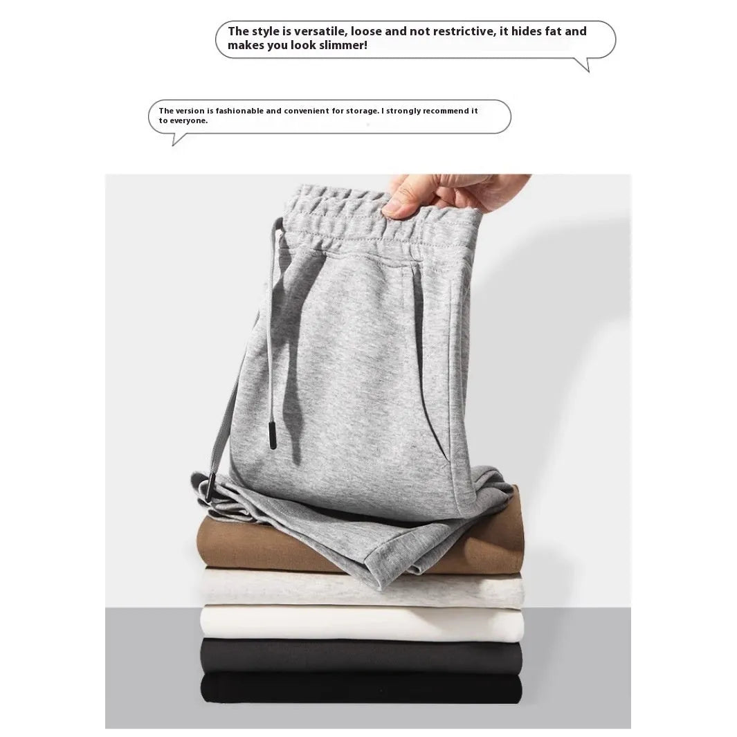 Men's and women's straight cut cotton sports shorts in multiple colours on a plain background.
