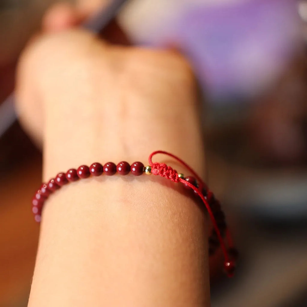 Purple gold sand design cinnabar bracelet with geometric shapes and auspicious patterns