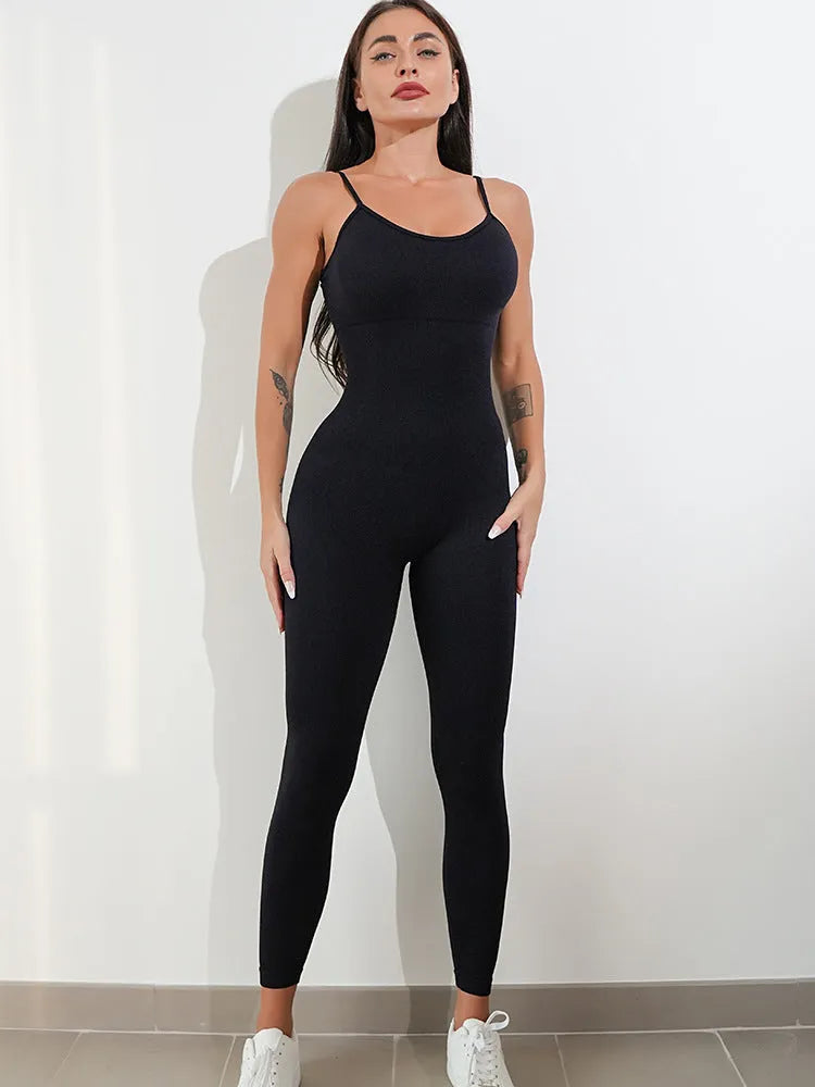 Women's black unitard jumpsuit with spaghetti straps and a backless design for tummy control.