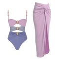 Women's solid colour one-piece swimsuit with gold buttons and matching skirt in black, blue, brown, or pink options