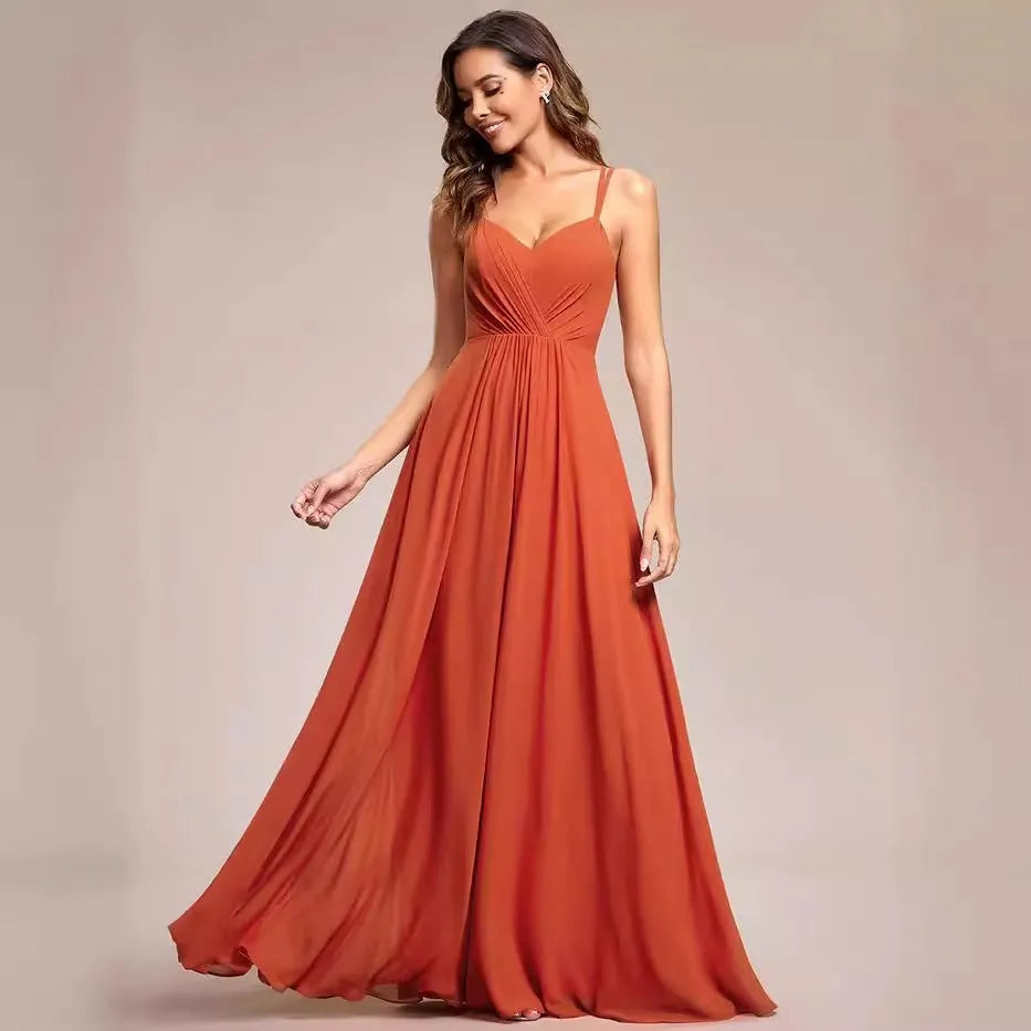 Women's sleeveless A-line long pleated dress in light green polyester fabric.