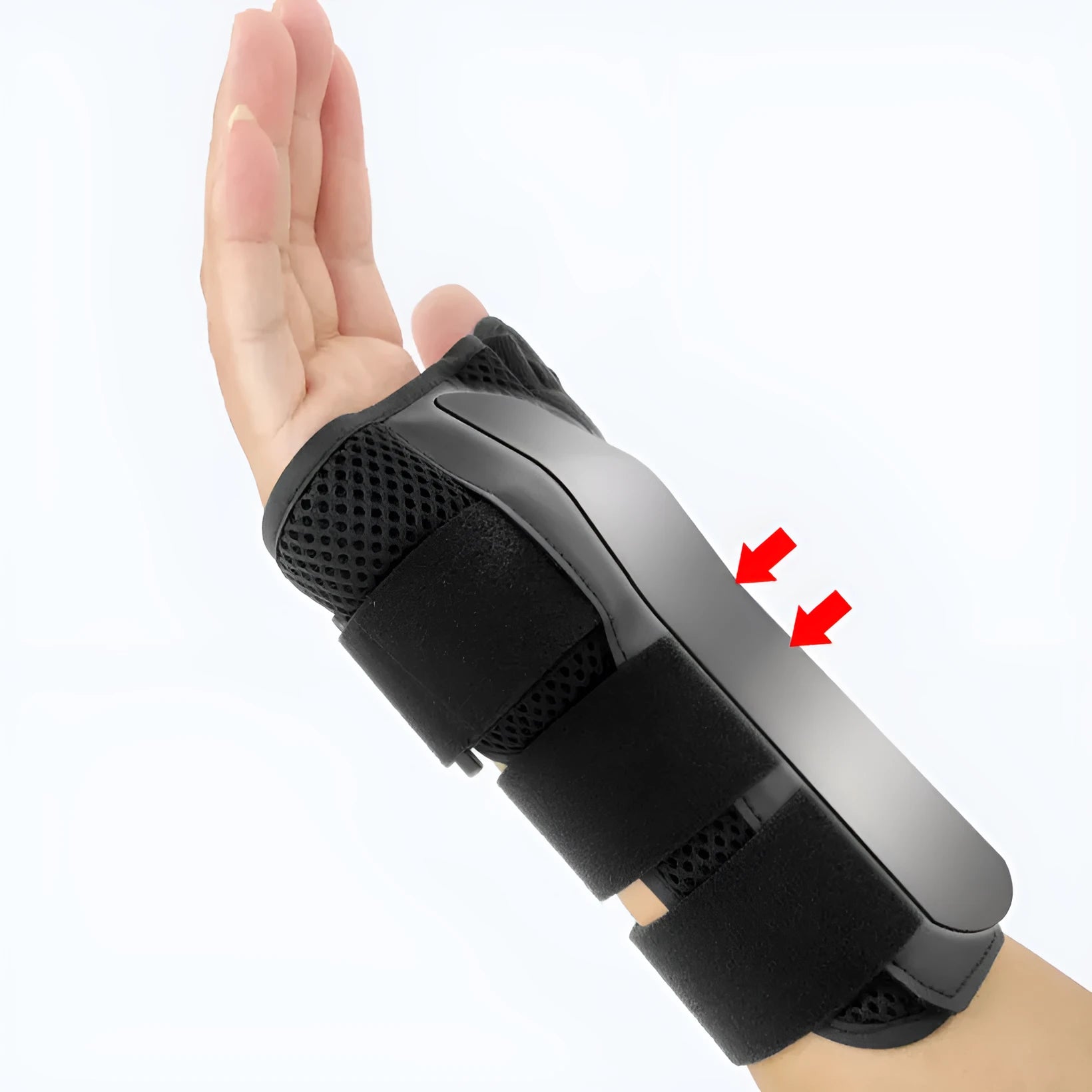 Black carbon fibre wrist guard with grey edging and a thumb strap, shown on a hand.