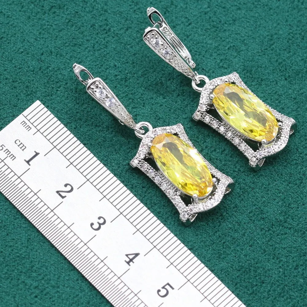 Anti-allergy zircon jewellery set with necklace, earrings, ring, and bracelet in yellow or olive colour.