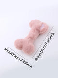Blue plush bone-shaped dog toy with a squeaker for chew-resistant interactive play.