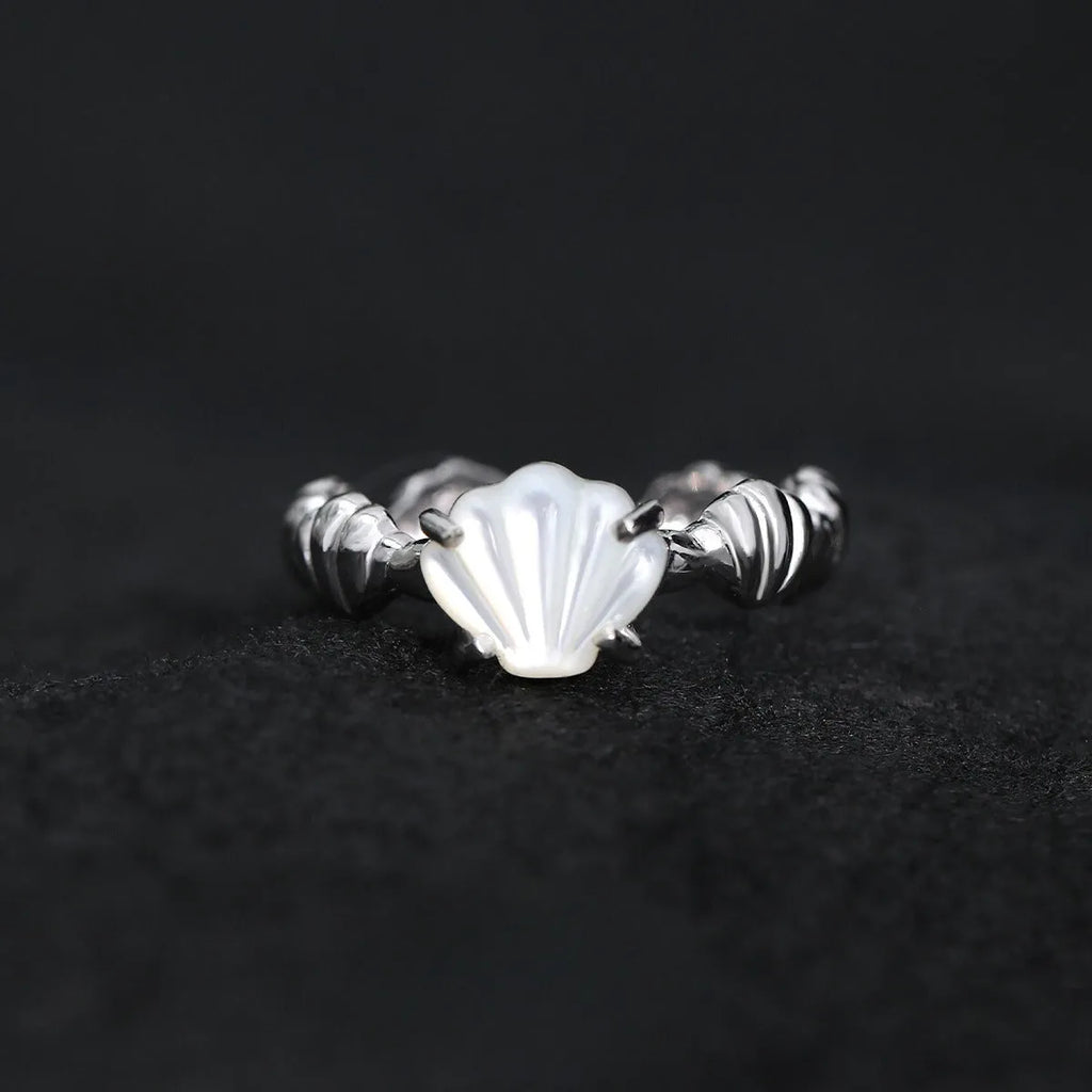 Women's adjustable silver ring with a shell tiger eye design in a gold tone finish.
