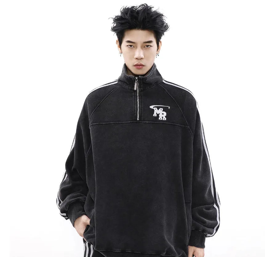 Black Hong Kong style stand collar long sleeve polyester sports hoodie on a hanger