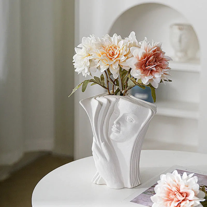 Glazed ceramic book stand in a modern style, shown in one of four colour options for desktop decoration.