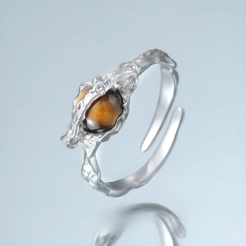 Women's adjustable silver open ring with Saturn design and white gold colour finish.