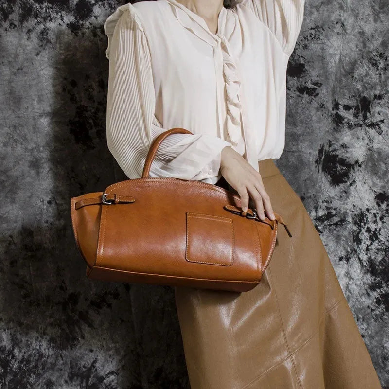 Genuine leather women's casual zip crossbody bag in brown with patchwork detail and multiple pockets