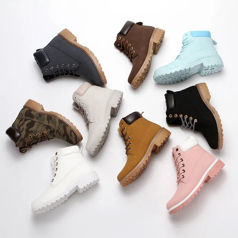 Pink men's Martin boots with velvet lining, round toe, and front lace-up closure on a flat bottom.