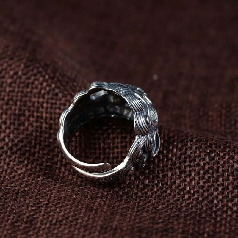 Silver open style ring with Jibeast animal zodiac pattern and diamond detailing