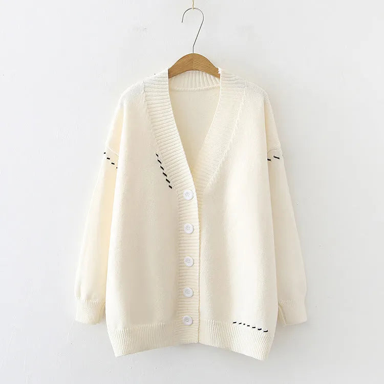 Women's loose knitted cardigan coat in black solid colour with long sleeves