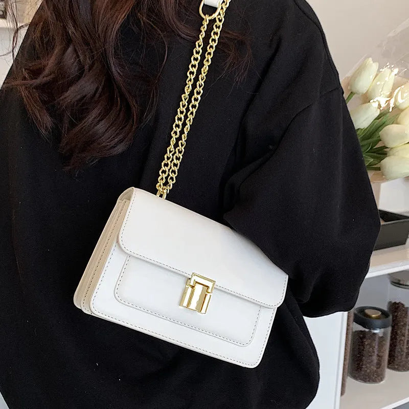 New fashion all-match summer chain messenger bag PU solid colour cross square shoulder bag with lock chain handle available in black green white yellow