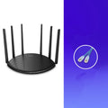 TP-Link TL-WDR7661 AC1900 Gigabit wireless router with compact black design and UK plug
