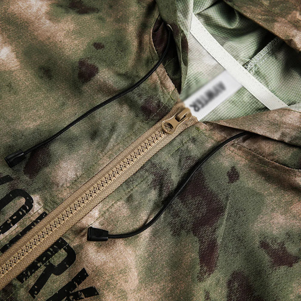 Hooded camouflage sun protection jacket for men, loose fit polyester fibre, shown in camouflage colour.