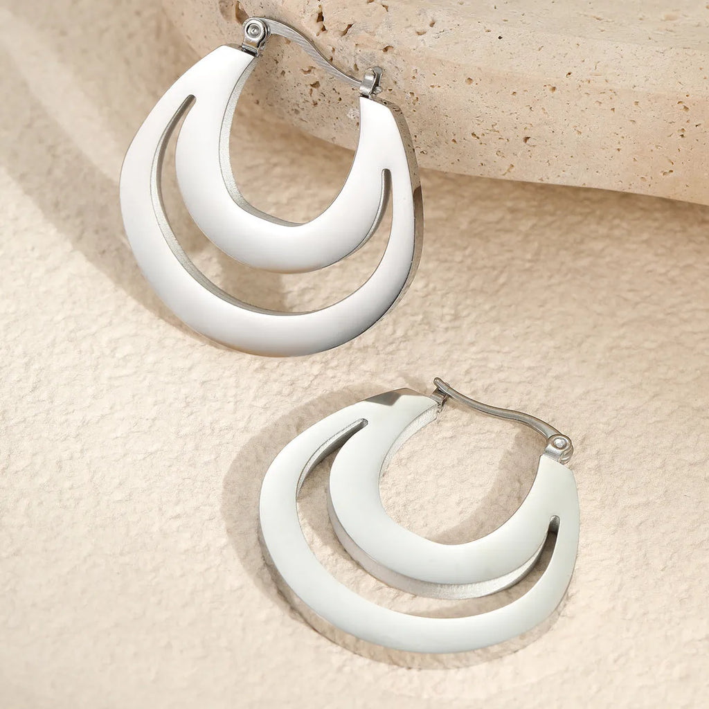 Geometric French earrings with round ring design in gold or steel metallic colours