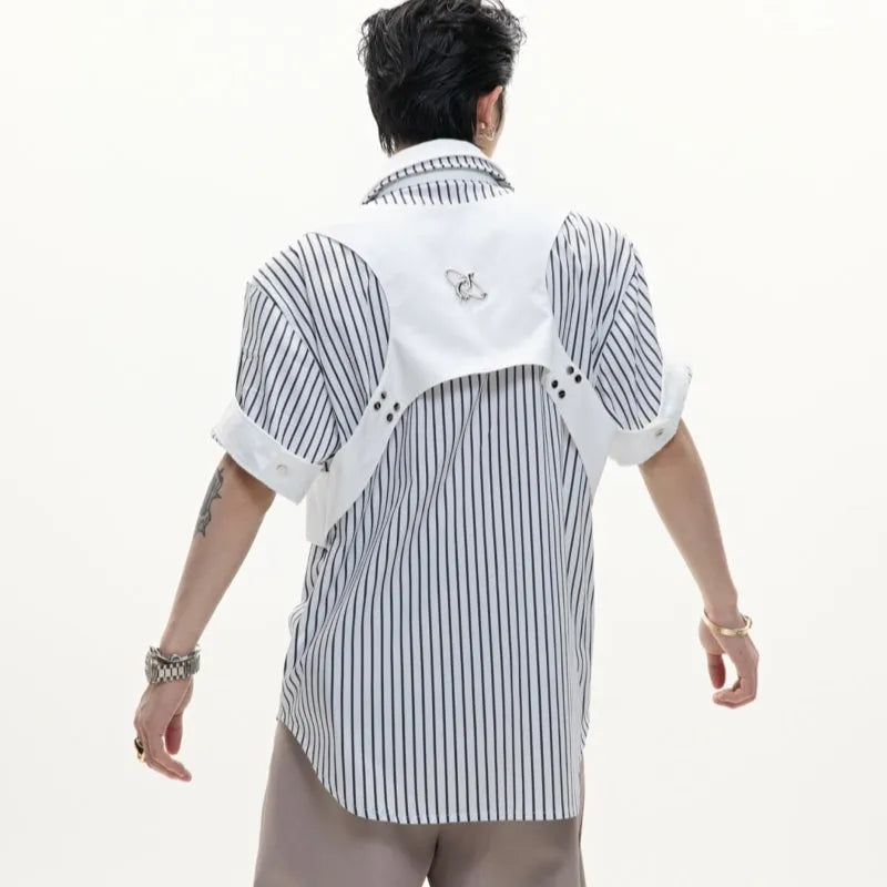 Man modelling a black and white striped cotton shirt with a double collar design and short sleeves.
