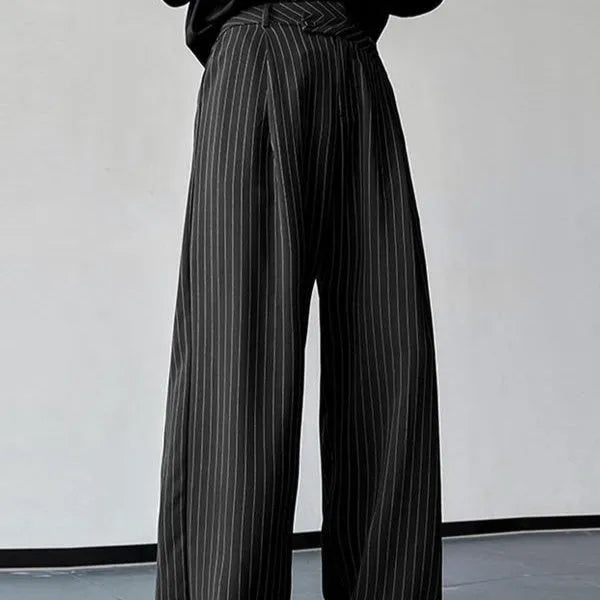 Black men's casual trousers with vertical stripes, front pleats, and an elasticated waistband.