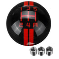 Black acrylic car gear knob for 5-speed manual, showing red lettering marking the gear positions.