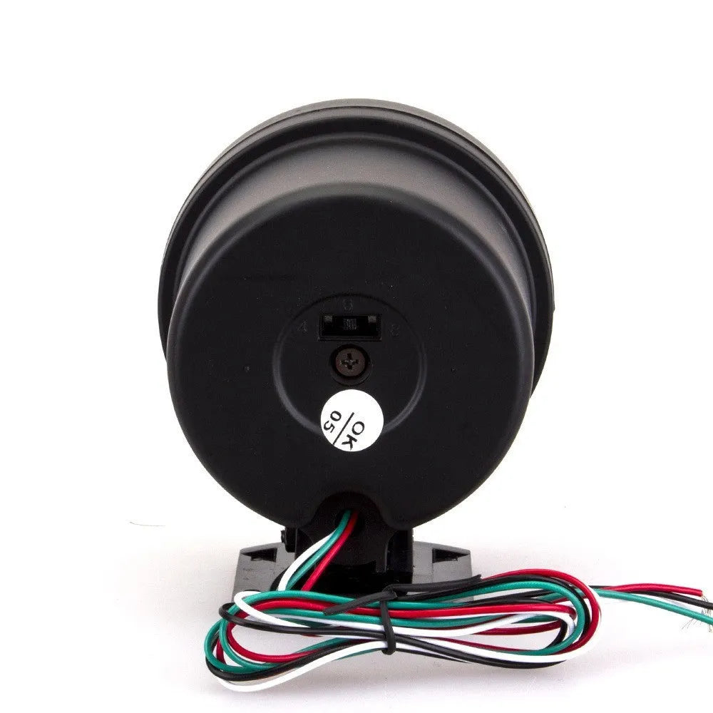 Black automotive tachometer with blue light pointer display showing engine rpm