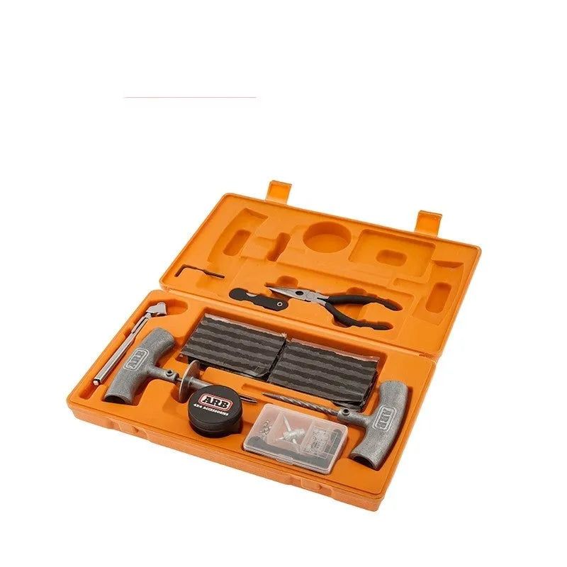 Car tyre repair tool kit with pressure gauge, insertion tool, reamer tool, and rubber strips in high-visibility case