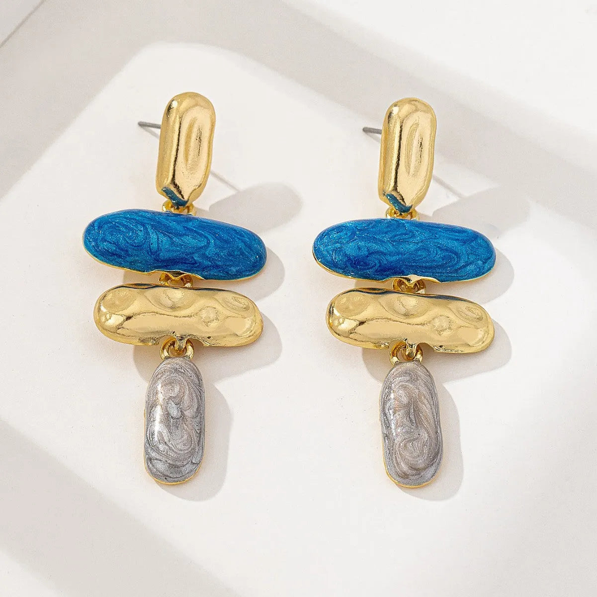 Geometric stud earrings with multicolour electroplating on zinc alloy