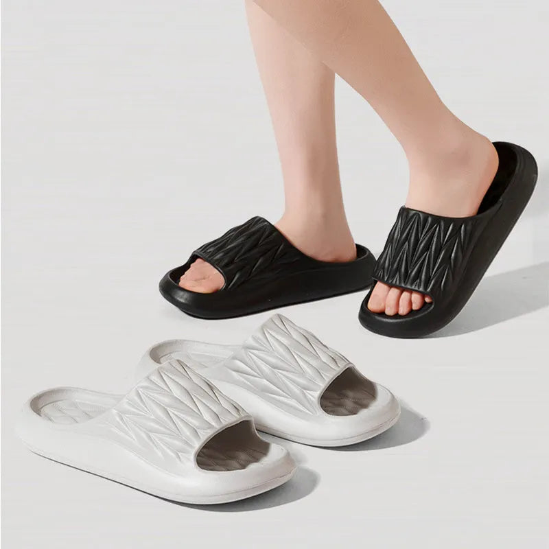 Leaf texture design EVA household slippers in various colours on a non-slip sole.