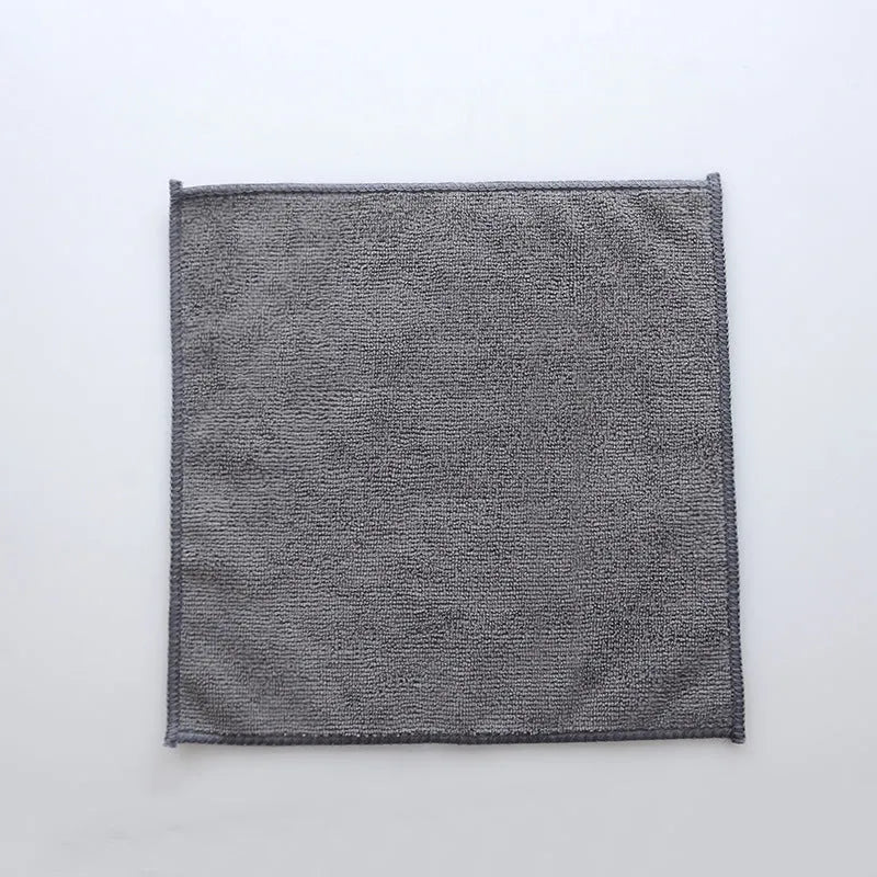 Grey square microfiber kitchen cleaning cloth for oil and grease removal on pots