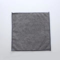 Grey square microfiber kitchen cleaning cloth for oil and grease removal on pots