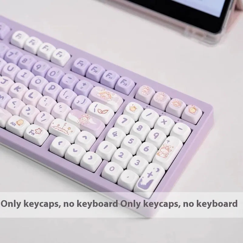 Close-up of purple gradient rabbit design on white PBT keycaps for mechanical keyboards.
