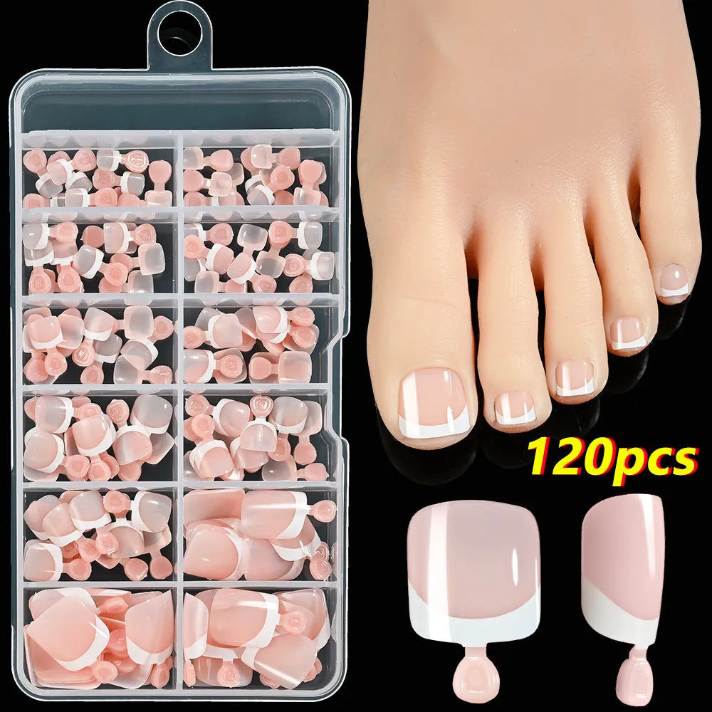 120-piece box of French white tip full square short nude nail appliqués in nine colour shades.