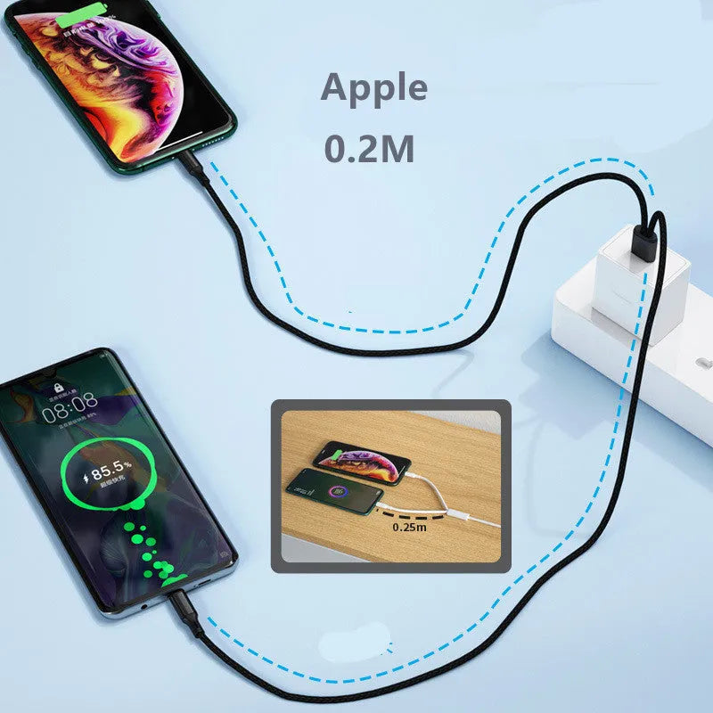 Black braided two-in-one USB charging cable with two Android connectors on a table.