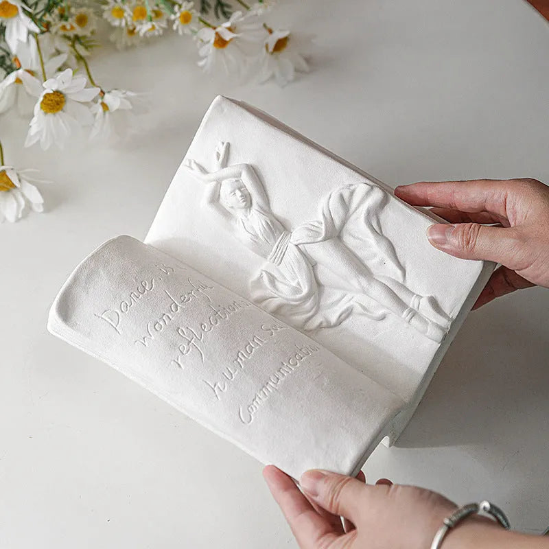 Glazed ceramic book stand in a modern style, shown in one of four colour options for desktop decoration.