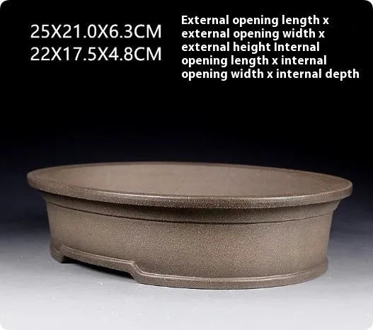 Handmade purple sand oval bonsai pot measuring 25x21x6.3cm with antique finish