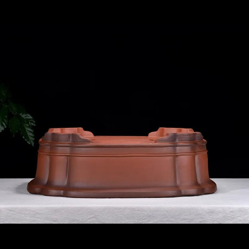 Large rectangular purple clay flowerpot with antique jade finish and Chinese crabapple carvings