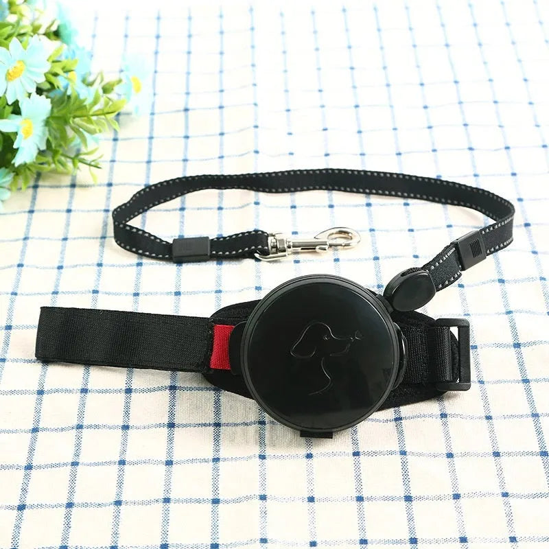 Automatic retractable dog leash extended to 3 metres, shown in vibrant orange colour.