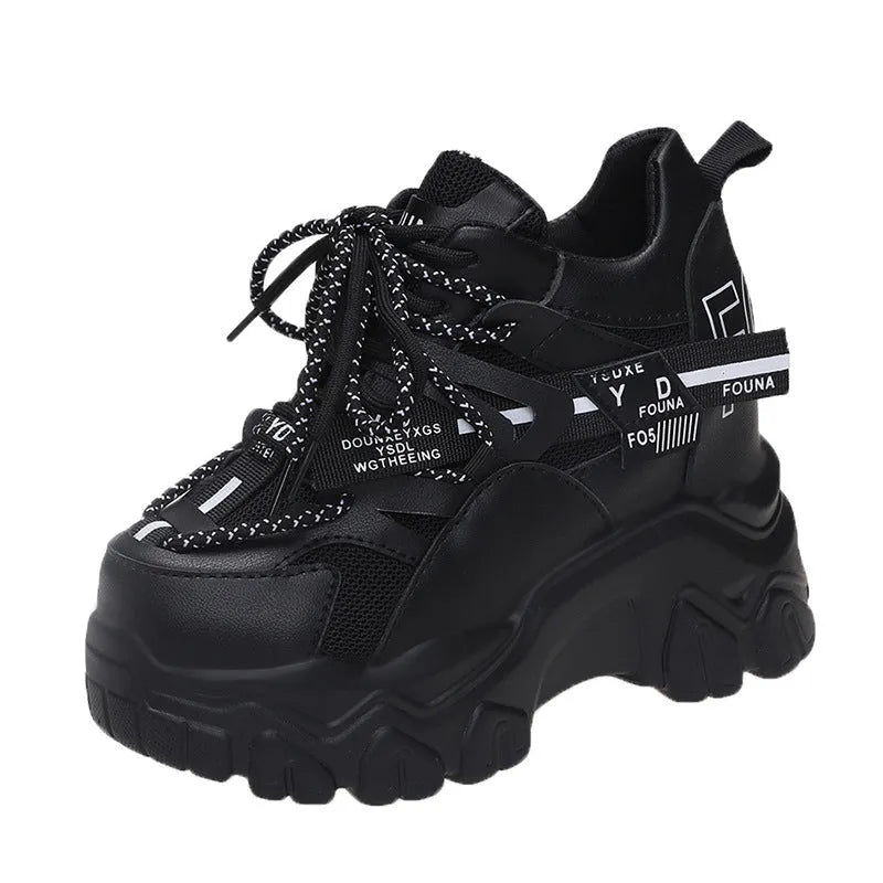 Women's white mesh platform sports shoes with cross strap and round toe on rubber sole.