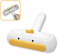 White portable reusable pet hair removal roller with cartoon duck design and dense bristles.