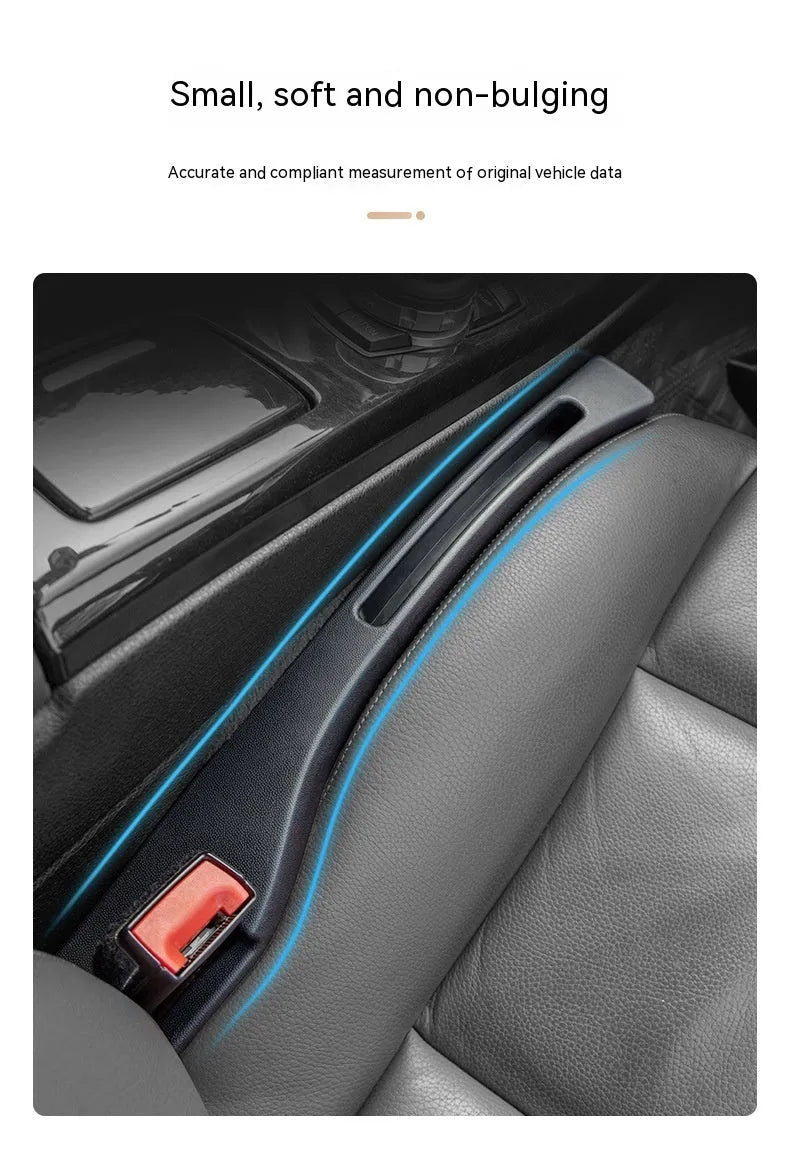 Black car gap storage box with handle placed between vehicle front seats