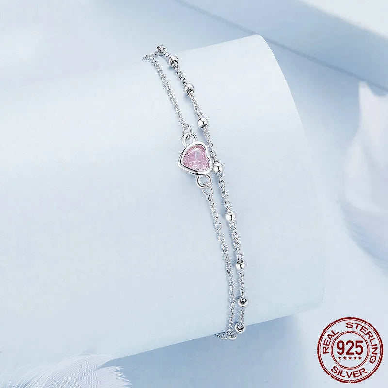 Sweet girlish style 925 sterling silver bracelet with heart pendant on adjustable chain.