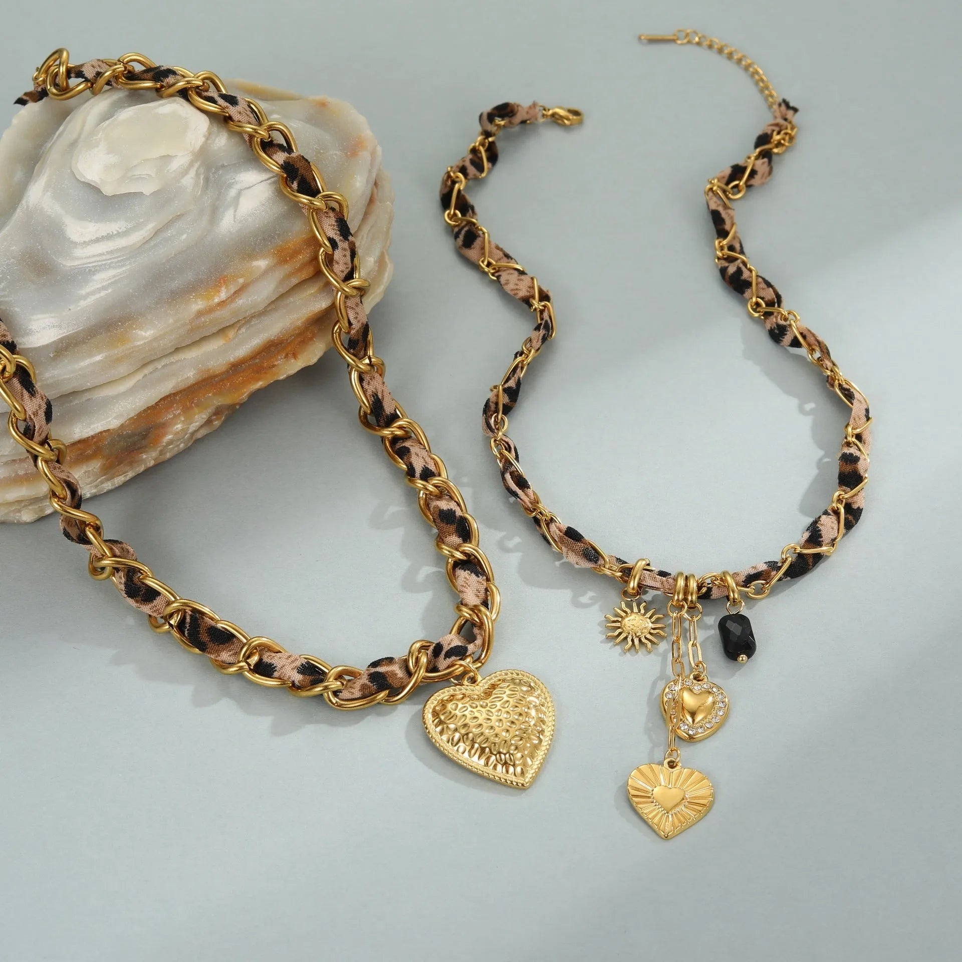 Geometric leopard love pendant necklace on stainless steel chain with 18K electroplated finish