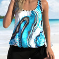 Blue floral tie-dye pattern women's two-piece swimsuit with high-waisted shorts for plus sizes.