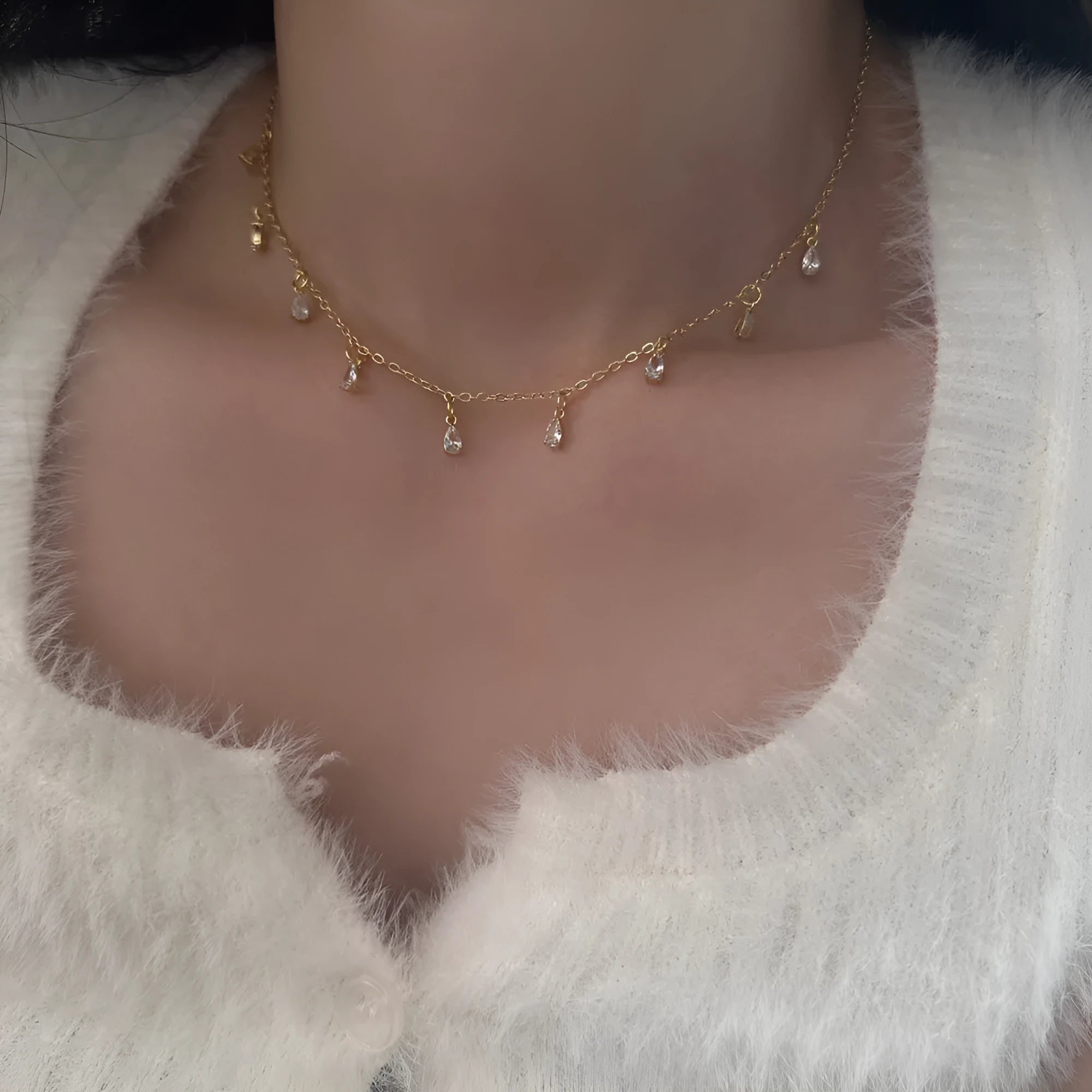 Zircon jewellery set with meteor shower geometric pendant necklace, matching earrings, and anklet