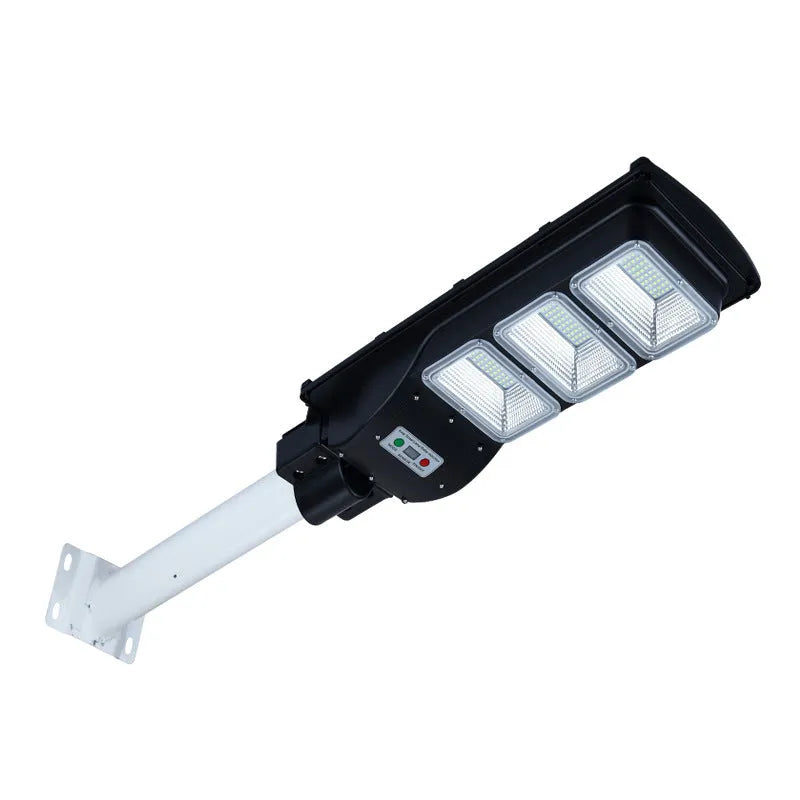 Integrated solar street light unit with solar panel and LED light source for outdoor installation