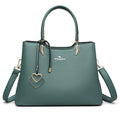 Women's black PU leather messenger bag with multi-layer interior compartments and a shoulder strap