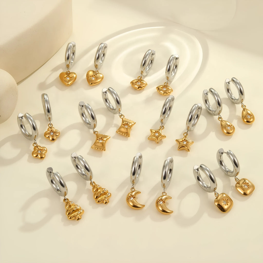 Pair of 18K gold plated stainless steel earrings featuring a Christmas tree design shaped into a heart.