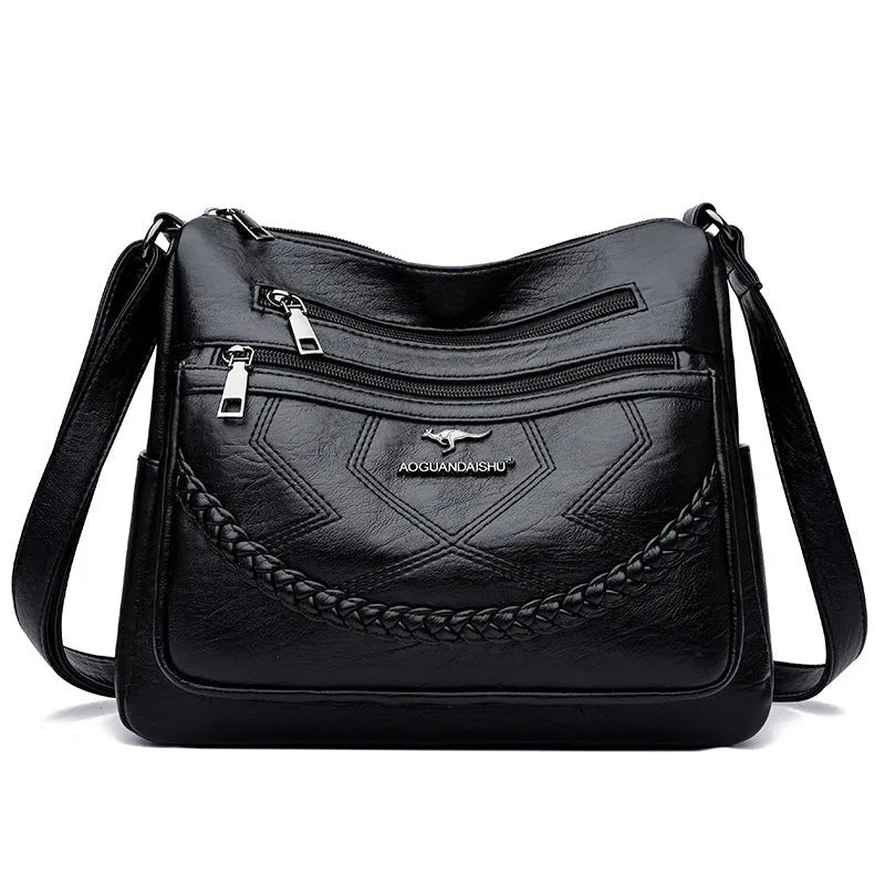 Soft PU leather women's crossbody shoulder bag in horizontal square shape with internal zipper compartments